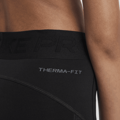 Nike Pro Therma-FIT Leggings mit mittelhohem Bund (Mädchen)