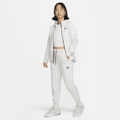 กางเกงจ๊อกกิ้งเอวปานกลางผู้หญิง Nike Sportswear Tech Fleece