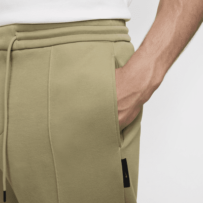 Pants de tejido Fleece entallados para hombre Nike Tech