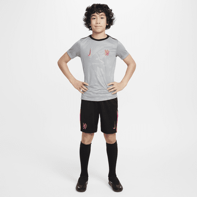 Przedmeczowa koszulka piłkarska dla dużych dzieci Nike Dri-FIT Chelsea F.C. Academy Pro (wersja trzecia)