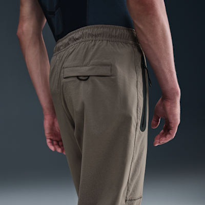 Calças entrançadas Nike Tech para homem