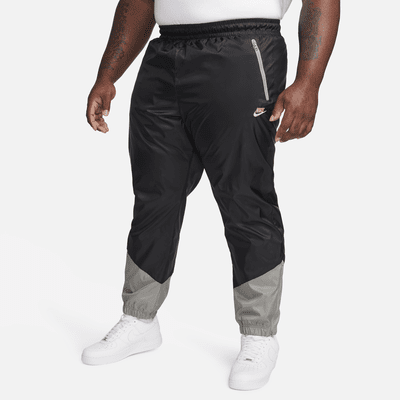 Pantalon doublé en tissu tissé Nike Windrunner pour homme