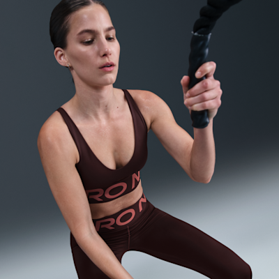 Nike Pro Indy Plunge sports-BH med innlegg og middels støtte til dame