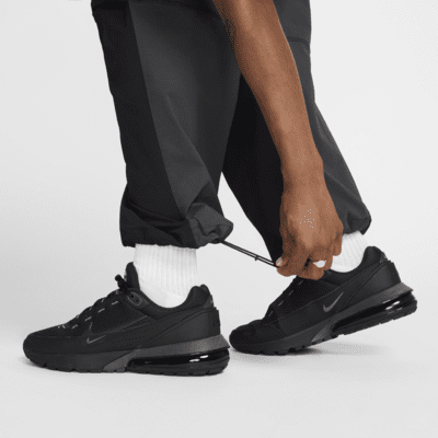 Pantaloni oversize in tessuto Nike Tech – Uomo