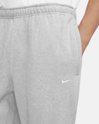 comerciante Fabricante Mercado Nike Solo Swoosh Pantalón de tejido Fleece - Hombre. Nike ES