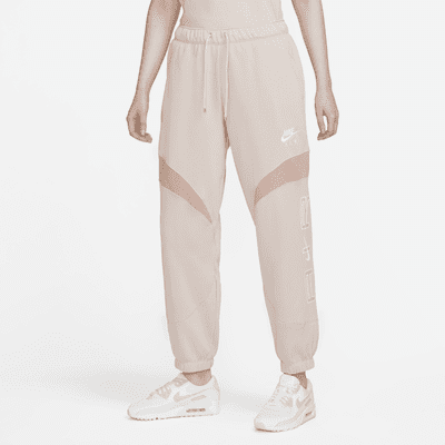 nike women's sportswear tracksuit joggers rust pink