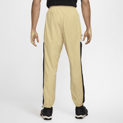 Pantaloni in tessuto da basket Nike Icon – Uomo