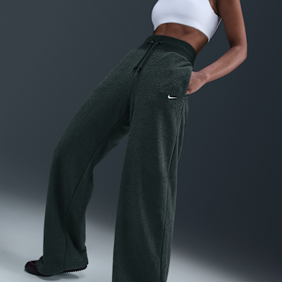 Pants de tejido Fleece cálidos de piernas anchas y tiro alto para mujer Nike Sportswear Phoenix Plush