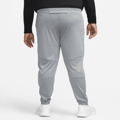 Nike Dri-FIT Challenger Pantalons de teixit Knit de running - Home