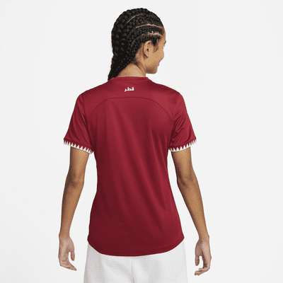 Qatar 2022/23 Stadium Home Women's Nike Dri-FIT Football Shirt. Nike IE