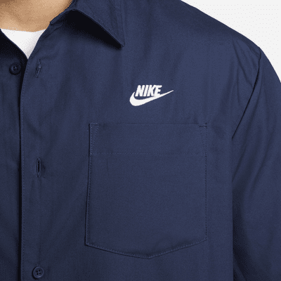 Playera de manga corta Oxford con botones para hombre Nike Club