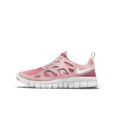 pink and white nike free run