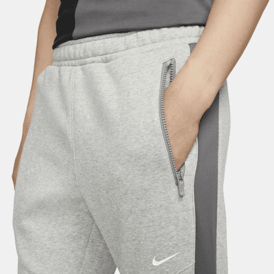 Pedir prestado Geografía Gimnasio Nike Sportswear Hybrid Jogger de tejido Fleece - Hombre. Nike ES
