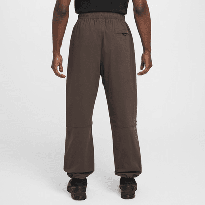 Pantaloni oversize in tessuto Nike Tech – Uomo