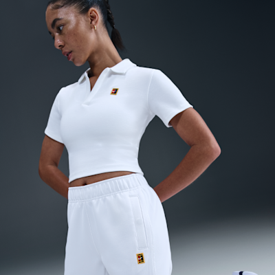 Pants de tenis de tiro medio para mujer NikeCourt Heritage Windrunner