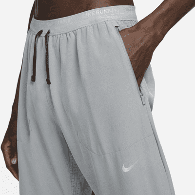 Pantaloni da running in tessuto Dri-FIT Nike Phenom – Uomo