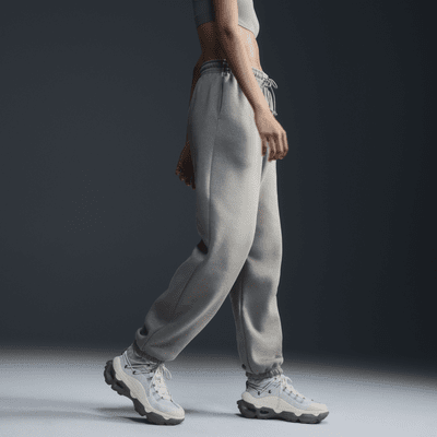 Pantaloni tuta oversize a vita alta Nike Sportswear Phoenix Fleece – Donna