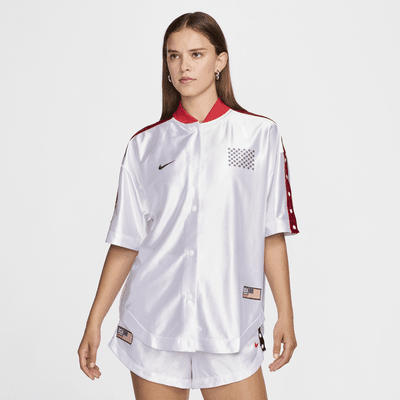 Playera de básquetbol Nike de temporada para mujer USA Village