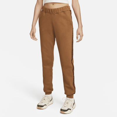 Nike Essentials Plush high-rise cuffed fleece sweatpants in bronze - BROWN  - ShopStyle Activewear Pants