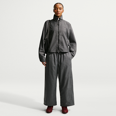 Pants de tejido Woven de tiro medio oversized para mujer Nike Sportswear