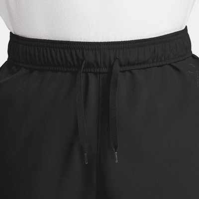 Pants Dri-FIT versátiles con dobladillo abierto para hombre Nike Form