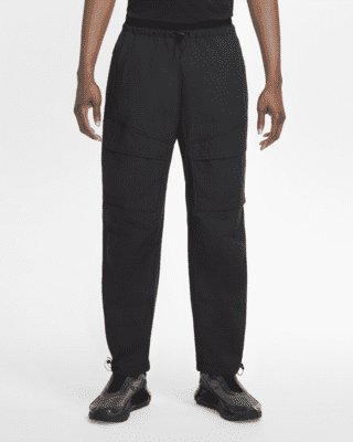 nike tech woven bonded pants