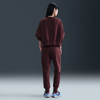 Pants de entrenamiento de tiro medio para mujer Nike Sportswear Phoenix Fleece