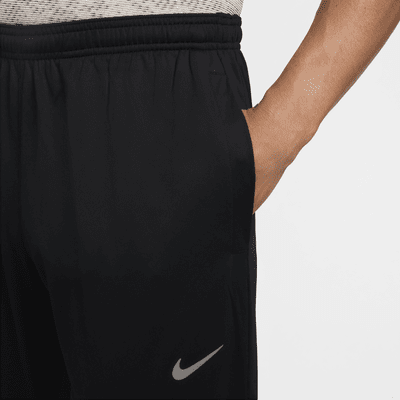 Nike Dri-FIT Challenger Men's Knit Running Trousers. Nike PH