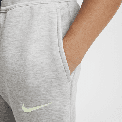 Spodnie piłkarskie dla dużych dzieci (chłopców) Nike FC Barcelona Tech Fleece