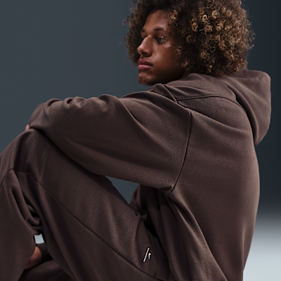 Męskie spodnie do koszykówki ze szczotkowanej dzianiny z luźnymi nogawkami Therma-FIT Nike Standard Issue