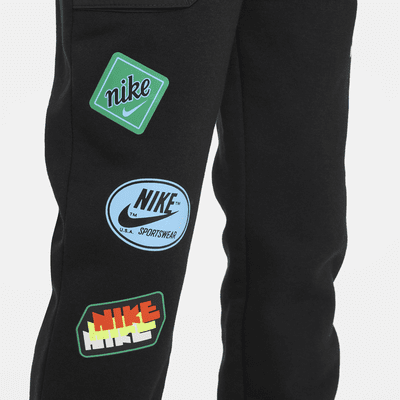 Pantalones de entrenamiento de tejido Fleece para niños talla pequeña Nike Sportswear
