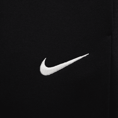 Sweatpants Nike Sportswear Phoenix Fleece med medelhög midja för kvinnor