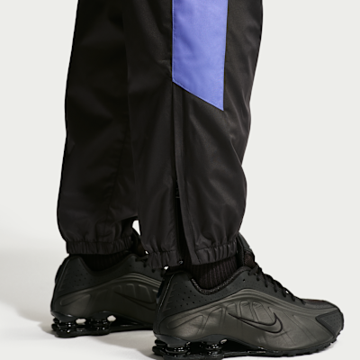 Nike Windrunner fôret bukse til herre