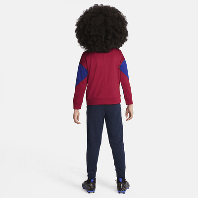 FC Barcelona Strike Nike Dri-FIT strikket fotballtracksuit til små barn