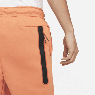 nike tech fleece joggers orange