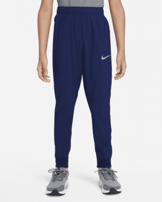 Nike Dri-FIT Geweven trainingsbroek voor jongens. Nike BE