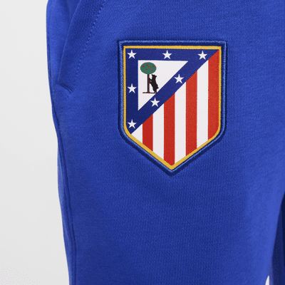 Atlético Madrid Club Thuis Nike voetbaljoggingbroek van sweatstof voor jongens