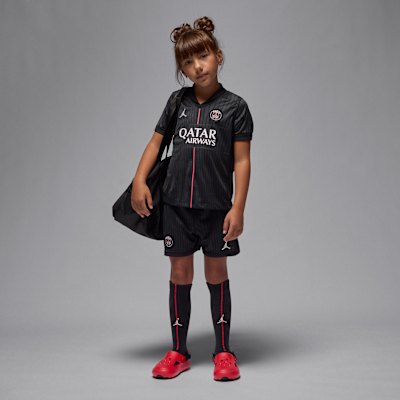 Conjunto de três peças de futebol Replica Jordan do quarto equipamento Stadium Paris Saint-Germain 2025/26 para criança