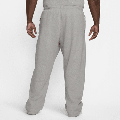 Pants de tejido Fleece con dobladillo abierto para hombre Nike Solo Swoosh