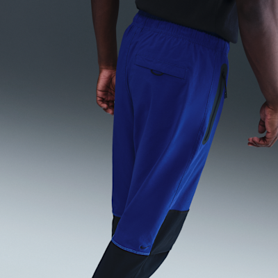 Męskie spodnie z tkaniny Nike Tech