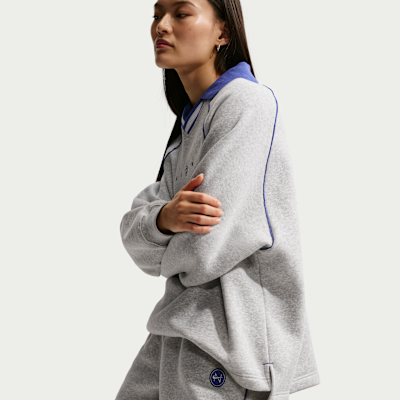 Calças folgadas de cintura subida com grafismo Nike Sportswear Phoenix Fleece para mulher