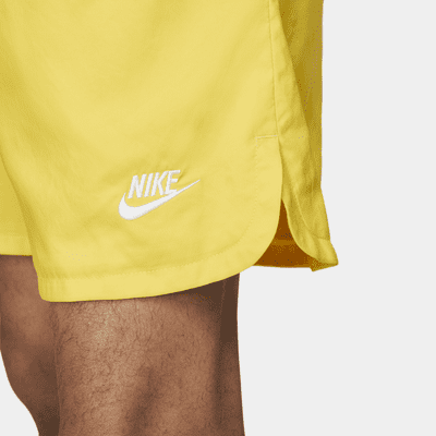 nike club essentials woven flow shorts yellow