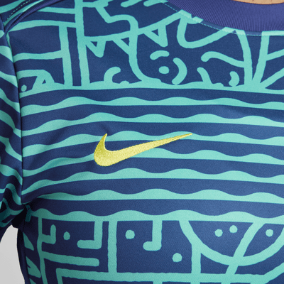 Playera de manga corta de fútbol Nike Dri-FIT para antes del partido para mujer Brazil Academy Pro