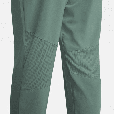 Nike Dri-FIT Fast Pantalons de 7/8 de cintura mitjana de running - Dona