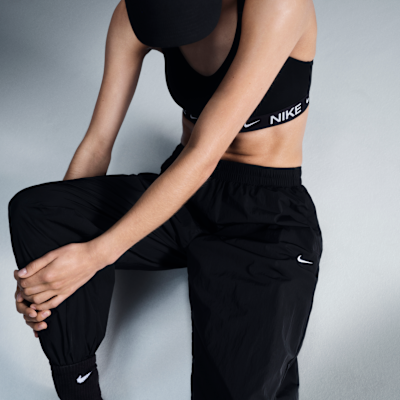 Joggers de tejido Woven oversized de tiro medio para mujer Nike Sportswear Essential