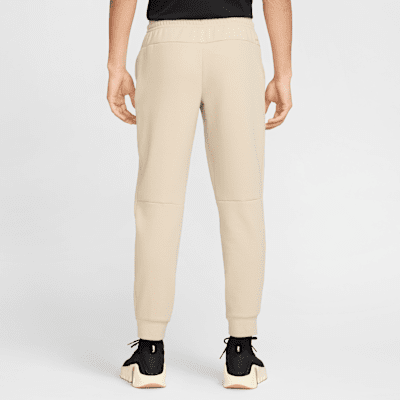 Joggers de alto rendimiento Dri-FIT con protección UV para hombre Nike Primary Fleece