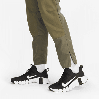 Nike A.P.S. Pants versátiles de tejido Woven Dri-FIT ADV para hombre