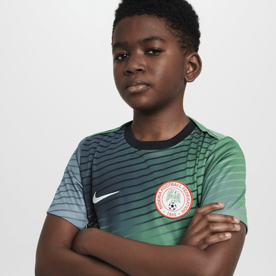 Předzápasové fotbalové tričko Nike Dri-FIT Nigeria Academy Pro pro větší děti s krátkým rukávem