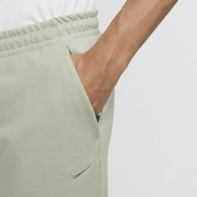 Pants Dri-FIT entallados versátiles con protección UV para hombre Nike Primary