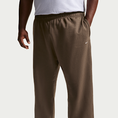 Pants de tejido Fleece con dobladillo abierto para hombre Nike Solo Swoosh
